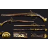 Flintlock Pistol, Carved Walnut, Brass Mounts, Length 19½ Inches.