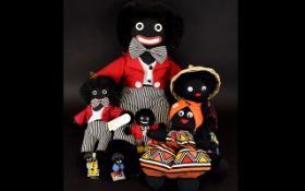 A Collection of Black Doll Soft Toys some with original labels.