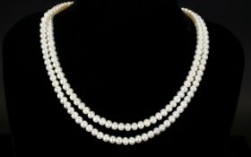A Twin Row Pearl Necklace with a 9ct Gold Clasp.