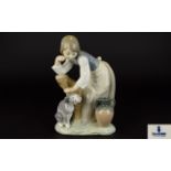 Lladro Porcelain Figure ' Caress and Rest ' Girl Patting Dog. Model No 1246. Issued 1972 - 1990.