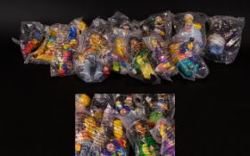 A Collection of Approximately 14 Simpson Toys.