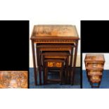 Chinese Hand Carved Nest Of Tables Four nesting tables,