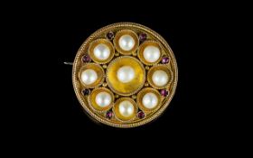 Antique Period Circular 9ct Gold ( Rich Colour ) Pearl and Garnet Set Brooch of Attractive Form.