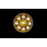 Antique Period Circular 9ct Gold ( Rich Colour ) Pearl and Garnet Set Brooch of Attractive Form.