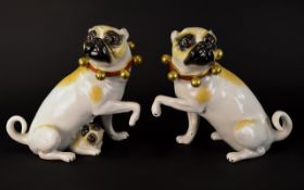 Rudolf Kammer - Dresden Pair of Very Fine Quality Porcelain Pug Dog Figurines.