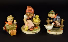 Three Hummel Figures Each in good condition,