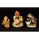 Three Hummel Figures Each in good condition,