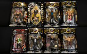 A Collection Of WWE World Wrestling Entertainment Action Figures including figures from the Classic