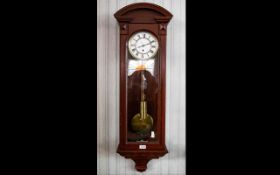 Mahogany Cased Vienna Wall Clock, White Chapter Dial With Roman Numerals, single weighted Movement.