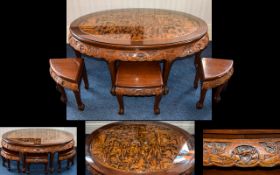 Chinese Tea Table With Nesting Stools Low oval wood table complete with six matching stools,