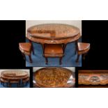 Chinese Tea Table With Nesting Stools Low oval wood table complete with six matching stools,