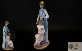 Nao by Lladro Figure ' Mother Figure ' with Daughter at Bedtime. c.1990's. Stands 11.5 Inches High.