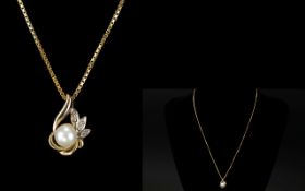 Ladies 9ct Gold - Pearl and Diamond Set Pendant Drop with Attached 9ct Gold Long Chain.