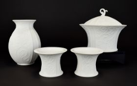 A Collection Of Kaiser Bisque Porcelain Items In 'Girlande' Design Four in total to include a pair