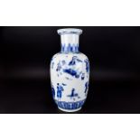 Antique Chinese Vase A large ovoid vase in traditional blue and white figurative design.