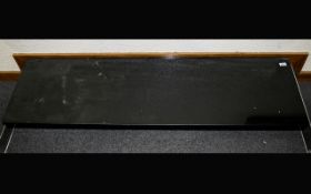 Contemporary Black Granite Hearth 60 by 18 inches.