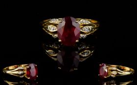 Ladies - 9ct Gold Ruby and Diamond Dress Ring.