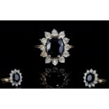 Ladies 9ct Gold Set Sapphire and Diamond Cluster Ring. Illusion Set - In Flower head Design.