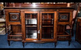 A Late 19th/Early 20th Century Brake Front Chiffonier Rosewood display cabinet with glazed centre