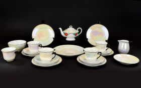 Part Tea Set. Compromising of five cups and saucers, one tea pot, one milk jug, one tray, one