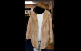 Blonde Fur Coat, fully lined with label to interior which reads 'Springs of Blackpool'.
