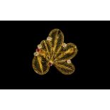 A Vintage Indian Brooch Unusual gold tone brooch of foliate design with reticulated wire work