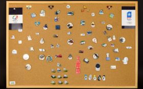 Winter Olympic Interest A Large Collection Of Sochi 2014 Enamel Pin Badges Presented on cork board,
