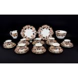 Staffordshire Part Teaset comprising 8 cups, saucers and side plates, a large sugar bowl and milk