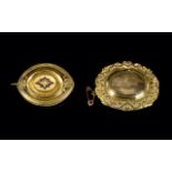 Two Antique Pinchbeck Mouring Brooches The first of oval form with reeded border and central star