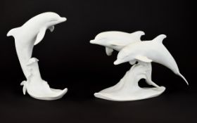 Two Kaiser Germany Bisque Porcelain Dolphin Figures White porcelain figure depicting two Dolphins at