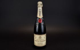 A 1966 Dry Imperial Bottle of Moet & Chandon Champagne.
