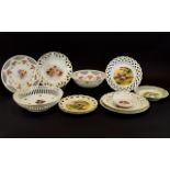 A Collection of Porcelain Ribbon Plates. Each plate depicting various decorative scenes to central