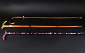 A Collection of Vintage Walking Sticks Three in total to include floral design,