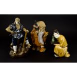 A Collection Of Chinese Earthenware Figures Three in total, each in good condition, the first in the