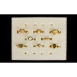 A Collection of ( 7 ) Seven 9ct Gold Set Assorted Dress Rings + ( 1 ) One 18ct Gold Diamond Set