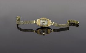 Ladies two Tone 1920's 9ct Gold Watch Attached To A Rolled Gold Mesh Bracelet Swiss movement, 15