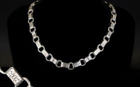 Antique Period Ornate Chased Decorated Silver Necklace of Pleasing Form. 18 Inches In length.