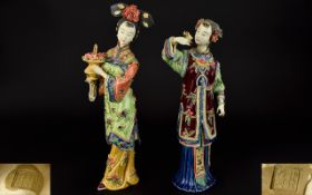 A Fine Pair of Hand Painted Porcelain Figurines - Mid to Late 20th Century Depicting a Pair of 19th