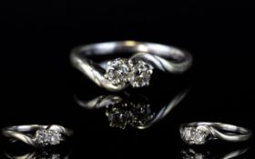 Ladies 9ct Gold Two Stone Diamond Set Dress Ring. The Diamonds are Small But Good Colour & Clarity.
