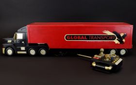 A Vintage Large Model Articulated Remote Controlled ' Battery ' Required Global Transport Long