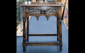 Carved Occasional Table Dark wood table with square top, turned legs and carved apron detail.