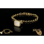 9ct Gold Curb Bracelet with Heart Shaped 9ct Gold Padlock. Fully Hallmarked. Gold Weight 8.