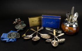 A Box of Assorted Collectables including silver plated flatware, berry spoon, opera glasses,