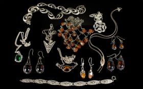 A Mixed Collection Of Silver And Amber Set Jewellery Twelve items in total to include several pairs