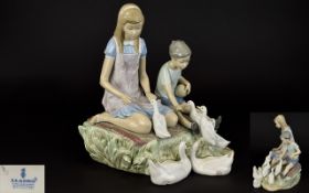 Lladro - Signed Porcelain Figure Group - Boy and Girl Playing ' Ducks at a Pond ' Model No 5303.