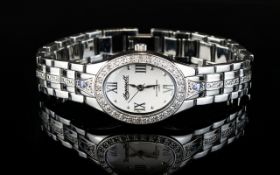 Ladies Ingersoll Wristwatch with diamonte jewelled face and silver toned metal bracelet.