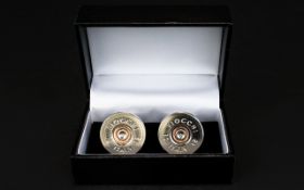 A Pair of Novelty White Metal Cufflinks designed in the form of gun cartridges.