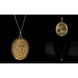 9ct Gold Oval Shaped St. Christopher's Medallion with Attached 9ct Gold Chain.