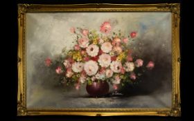 A Large Floral Still lIfe Oil On Canvas