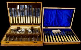 Montague and Co Fish and Knife Set housed in a wooden case with blue polysatin lining and Sheffield